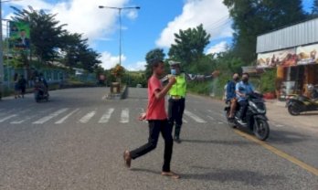 PAM Jumat Agung, Polisi Imbau Umat yang Gunakan Motor Wajib Pakai Helm
